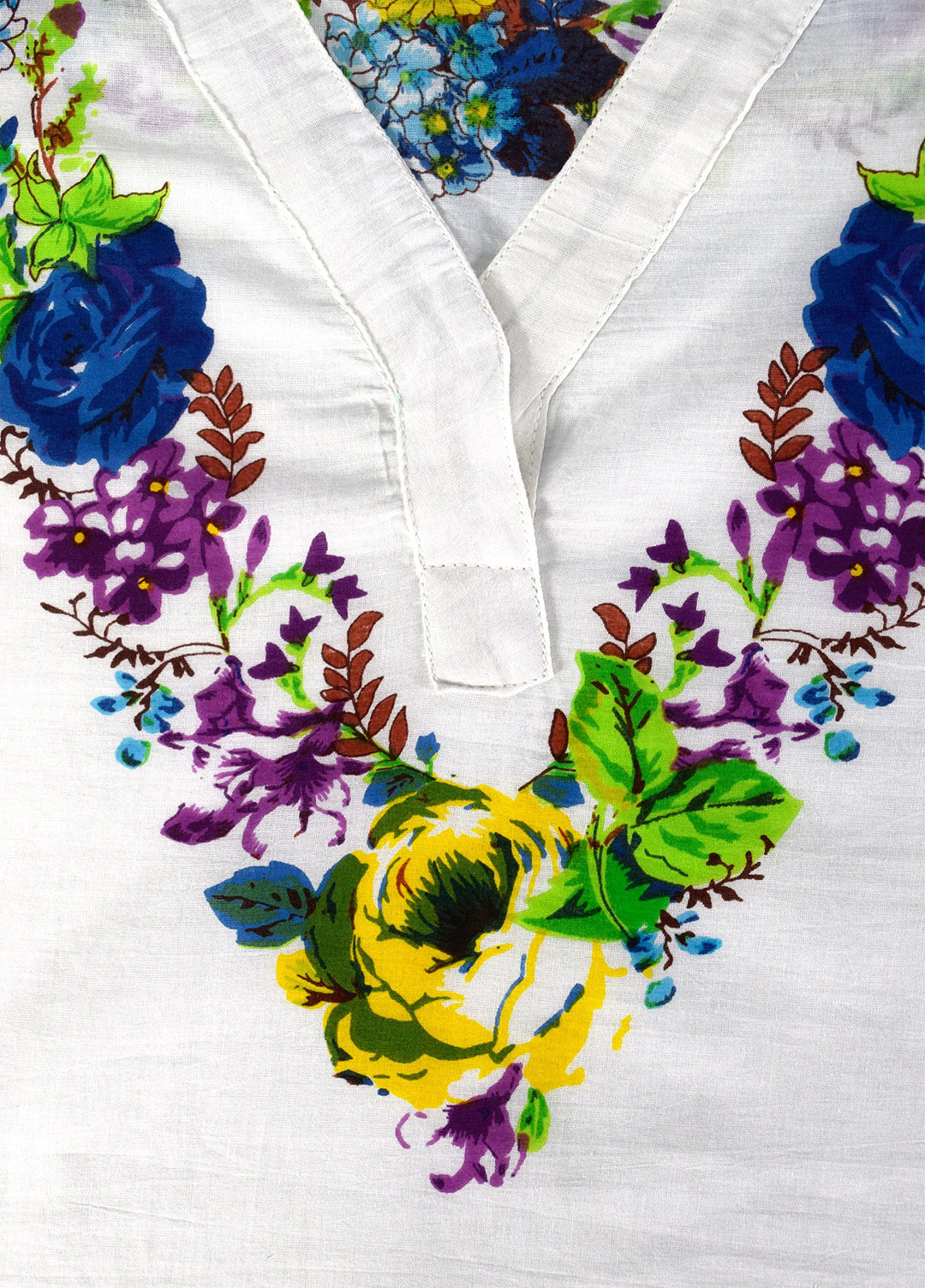 Vintage-style petite cotton tunic coverup featuring floral embroidery, perfect for beachwear.
