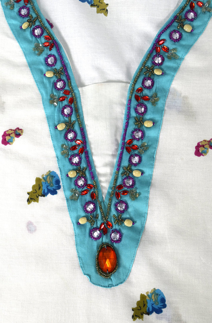 Turquoise vintage-style petite cotton tunic with floral embroidery and beaded accents, ideal as a beachwear cover-up.